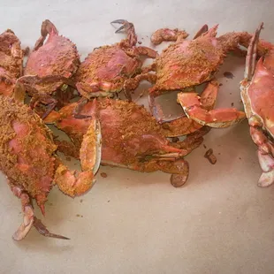 a pile of crabs on a table