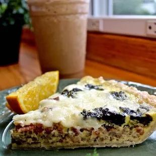 a slice of pizza on a plate