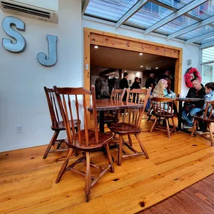 a group of people sitting at a table