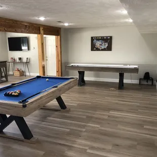 Pool table, shuffle board table.