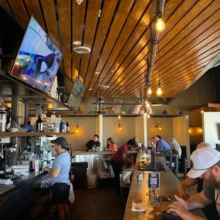people sitting at the bar