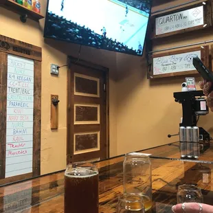 a man holding a glass of beer