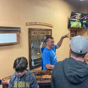 a man standing at a bar