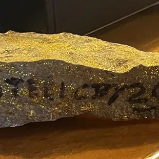 A rock in the shape of a pizza slice