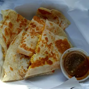 Bacon, egg and cheese breakfast quesadilla salsa on the side. Yummy!