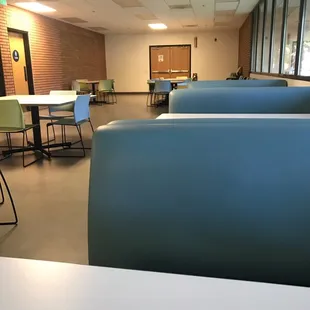 tables and chairs in a cafeteria
