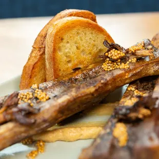 Smoked Bone Marrow - pickled mustard seeds, onion soubise, wild mushrooms, sourdough