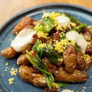 Crispy Potatoes - cheddar powder, bone marrow aioli, charred scallion, tasso ham