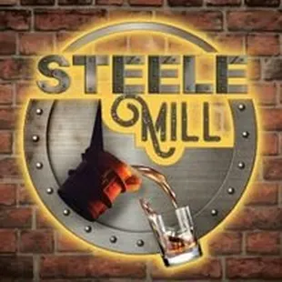 a bottle of whiskey being poured into a glass