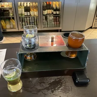 Flight provided in gear box - Mexican Lager served with lime and Weiss served with lemon.