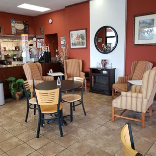 a coffee shop with chairs and tables