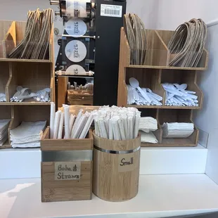 a display of white teaspoons