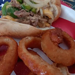Onion rings and Philly cheese steak