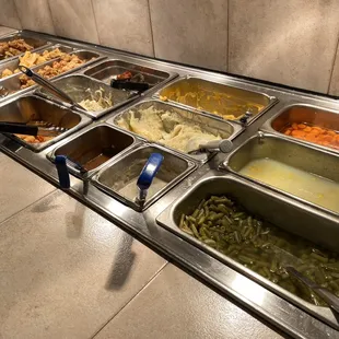 a buffet with many different types of food