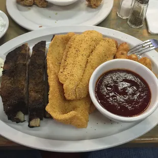 The BBQ: Ribs and catfish with two sides.