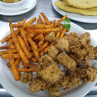 Jalapeno chicken and sweet potato fries.