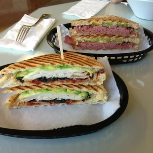 Positano panini: oven roasted turkey, avocado, sun-dried tomato pesto, black olives, provolone cheese &amp; red onion!