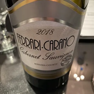 a bottle of wine on a table