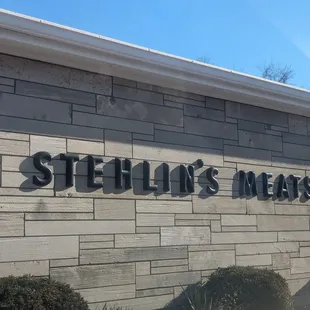 a sign on the side of a building