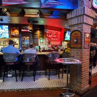 people sitting at the bar