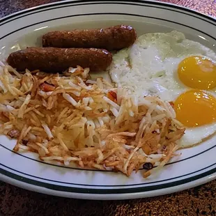Over easy eggs and sausage