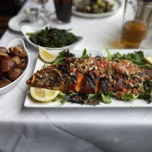 Whole Fish Red Snapper with broccolini and roasted potatoes