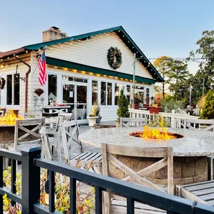a patio with a fire pit