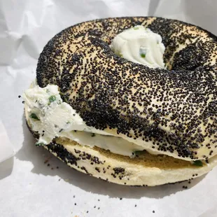 Poppy seed bagel with chive cream cheese.