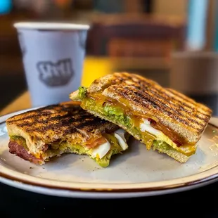Bacon, avocado, egg, and cheese sandwich