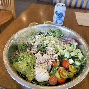 The big salad with turkey all the greens an egg, avocado, and extra sunflower seeds delicious And lemon vinaigrette dressing