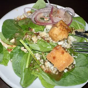 Spinach salad with Gorgonzola, cornbread croutons and warm bacon dressing