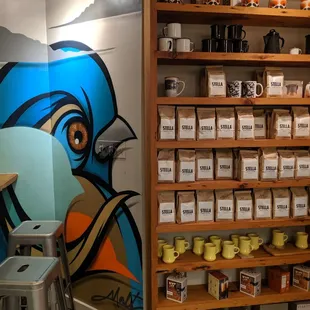 Mugs, artwork and a tiny nook to sit in.