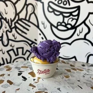 ube pan de sal and mango sticky rice in a split single scoop