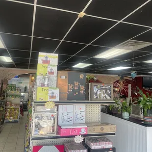 Inside. Restaurant on right store on left.