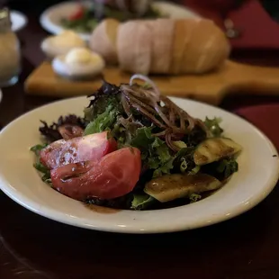 Delicious and fresh side salad with house made balsamic and fresh baked bread!