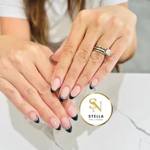 Almond Shaped Nail With Black French Tip.