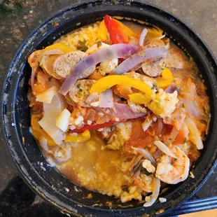 a bowl of stew with meat and vegetables