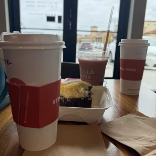 Toasted cinnamon latte, blueberry muffin, wild berry smoothie, and traditional latte