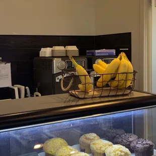 a display of cupcakes and muffins