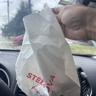 Sandwiches are typically served in Togo boxes but whoever was working on sandwiches shoved this to the drive thru cashier