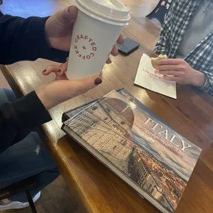Vanilla latte and lots of travel photo books which are cool