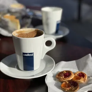 Double shot cappuccino w/ almond milk, Italian almond cookies with raspberry &amp; apricot jams