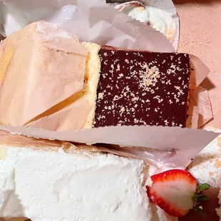 Cannoli; slices: Sacripantina; Tiramisu; Strawberry Shortcake