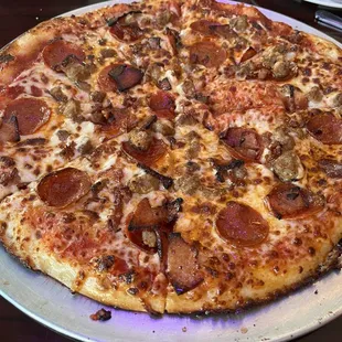 Large meat lover with Cheesy bread for $24.99