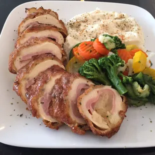 CHICKEN LE CORDON BLUE.         Smoked Ham and Provolone cheese stuffed And Rolled Chicken Breast fry to perfection