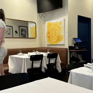 a woman standing in a restaurant