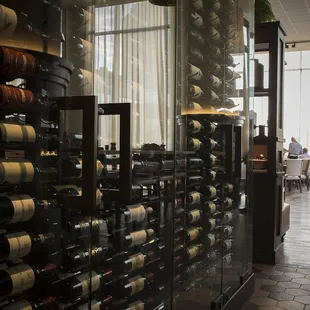 Choose a bottle from our destination-worthy wine selection via the wine menu or the fully enclosed glass wine display