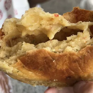 Gooey inside of the cheese empanada