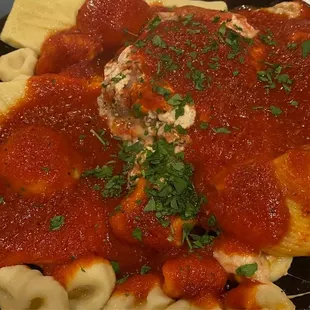 a plate of pasta and meatballs