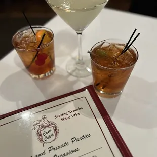 two cocktails on a table